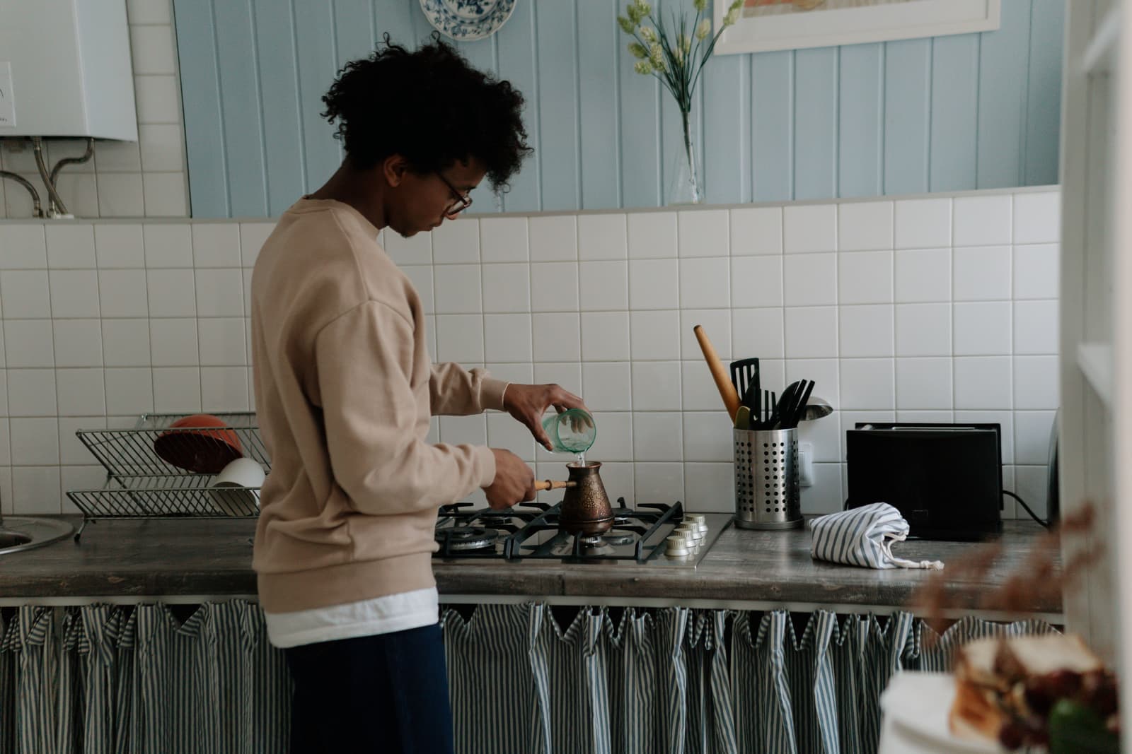 Someone making coffee at home